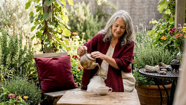 Experienced healer welcomes guest in cozy office