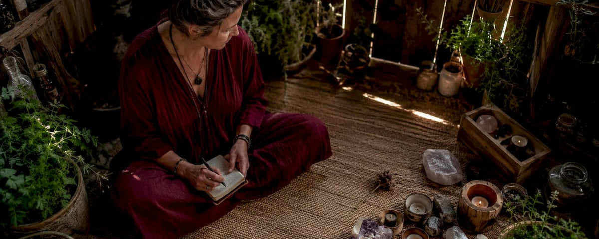 Woman journaling in meditation room