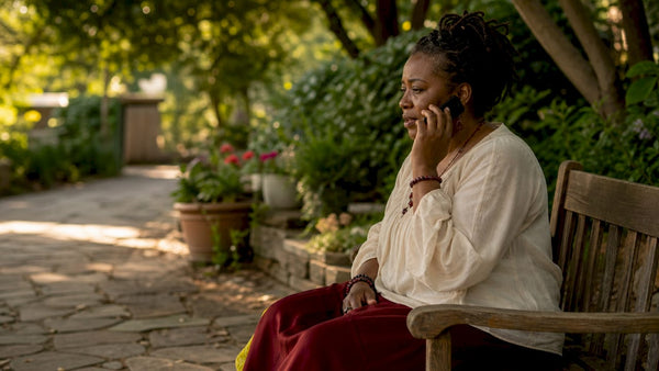 Woman making a follow-up call for spiritual healing