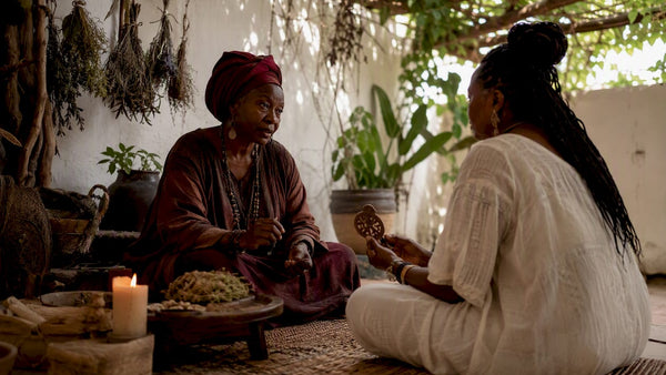 West African ritual consultation between practitioner and client