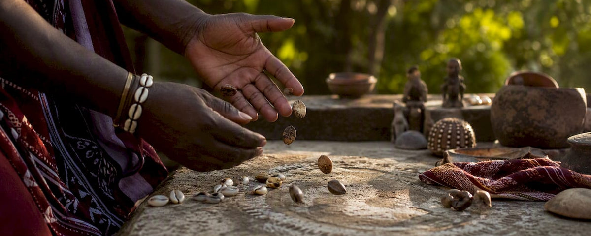 Hands casting Fa divination palm nuts